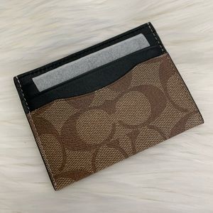 coach slim id card case in signature canvas